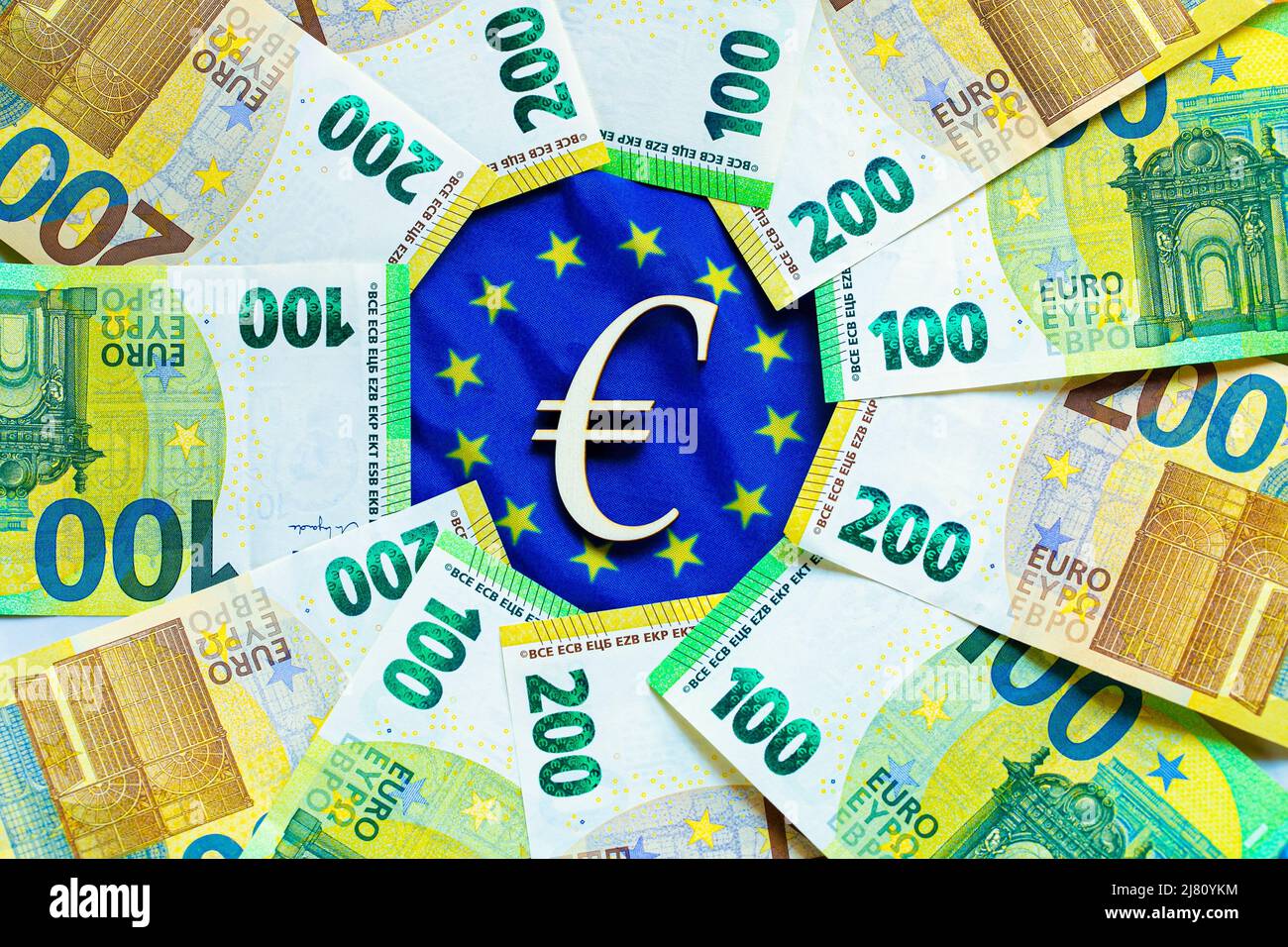 Euro exchange rate. state of the economy and currency of the EU countries. euro bills and the sign on the flag of the European Union.Depreciation of Stock Photo