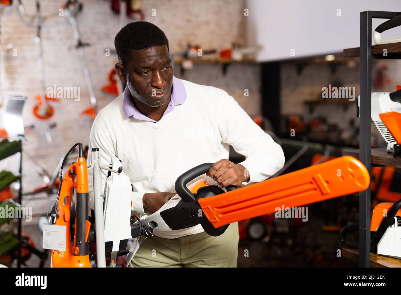 Choosing tools garden centre hi-res stock photography and images - Alamy