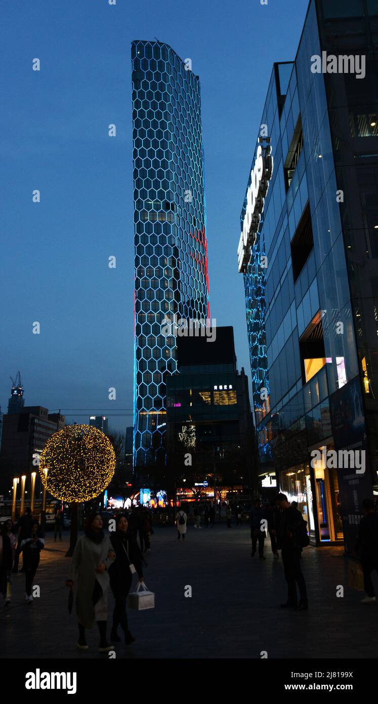 The Intercontinental Sanlitun Tongying Center hotel illuminated at night. Beijing, China. Stock Photo