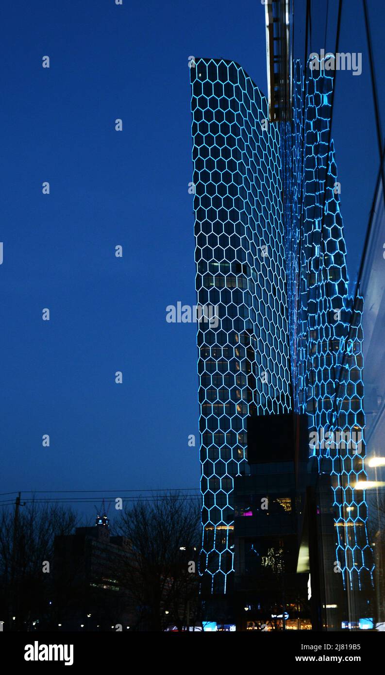 The Intercontinental Sanlitun Tongying Center hotel illuminated at night. Beijing, China. Stock Photo