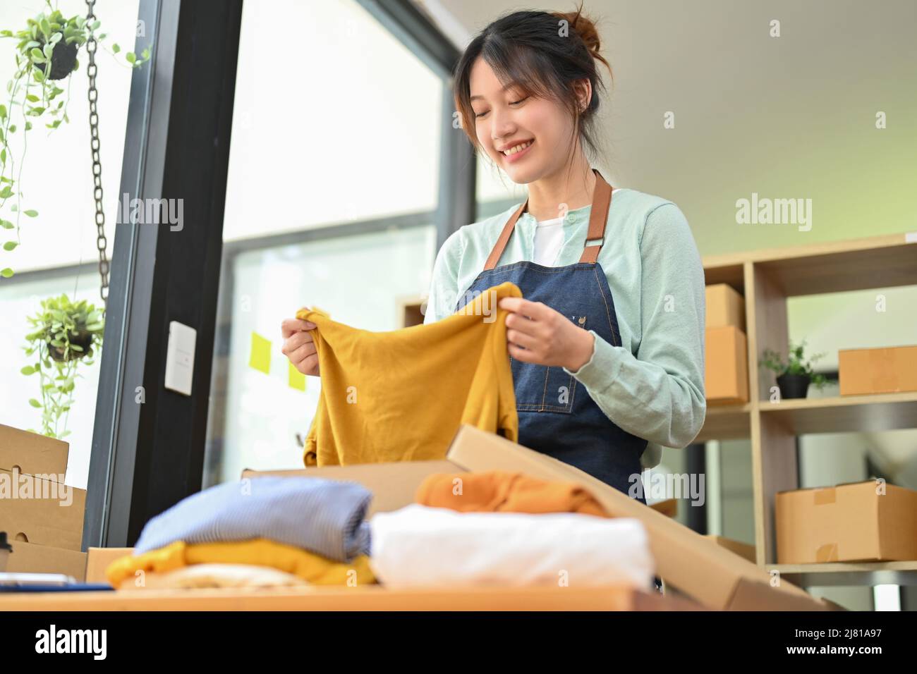 Folding Shirt Asian Woman Folding