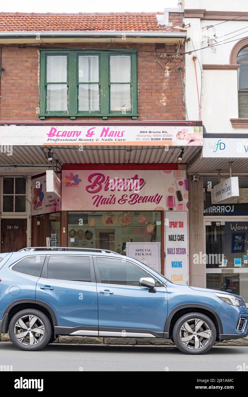 Bronte Nails & Beauty or Beauty & Nails in Waverley, New South Wales, Australia forms part of a long suburban shopping strip, common in Sydney suburbs Stock Photo