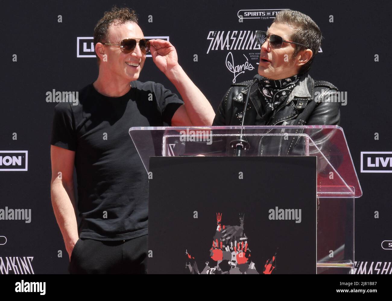 Los Angeles, USA. 11th May, 2022. (L-R) Stephen Perkins and Perry Farrell of Janes Addiction at the Smashing Pumpkins Handprint Ceremony held at the TCL Chinese Theater on Wednesday, ?May 11, 2022. (Photo By Sthanlee B. Mirador/Sipa USA) Credit: Sipa USA/Alamy Live News Stock Photo