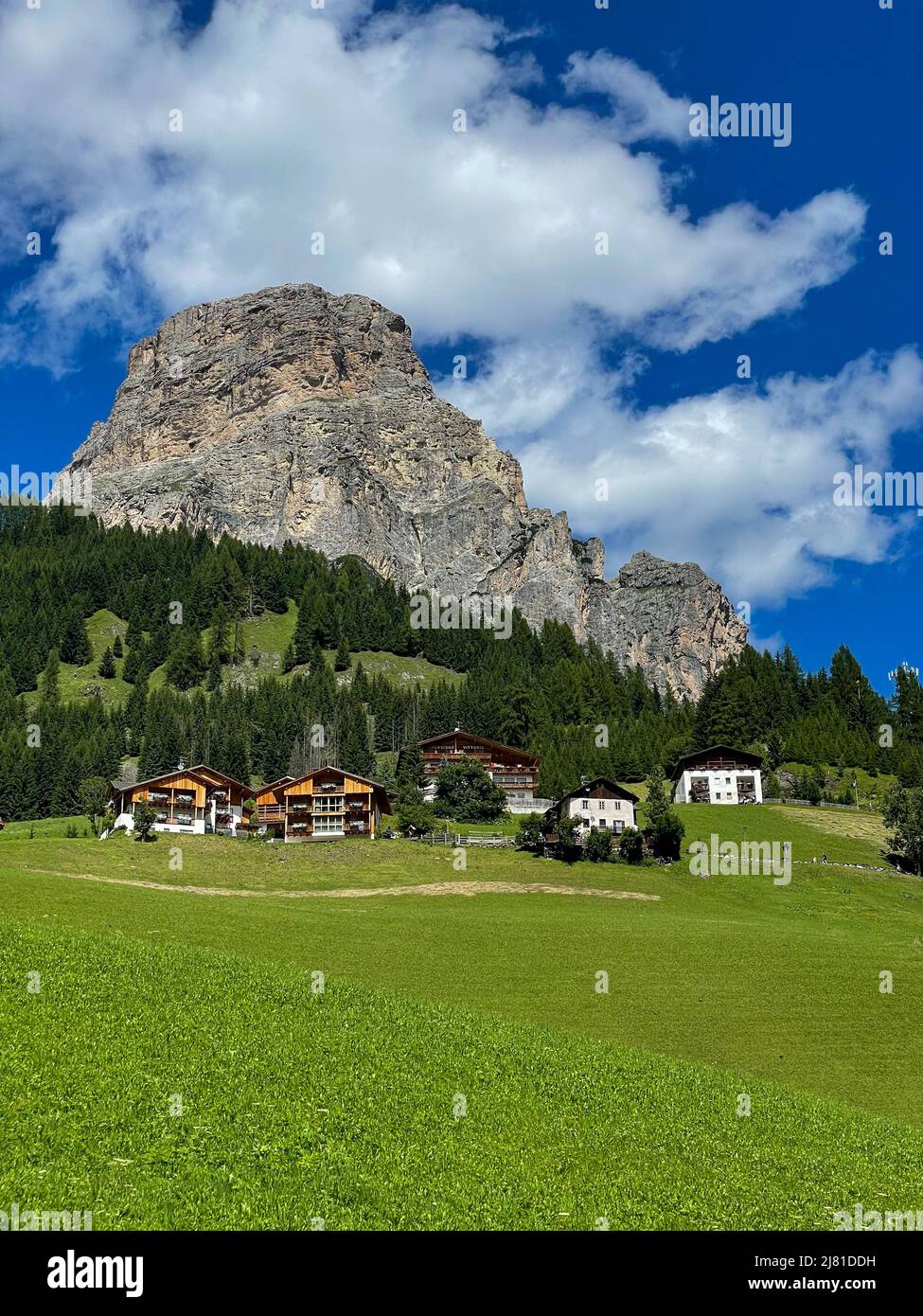 Colors of the Dolomites in the Funes view of the valley in Southern Tyrol, Italy. Green grass