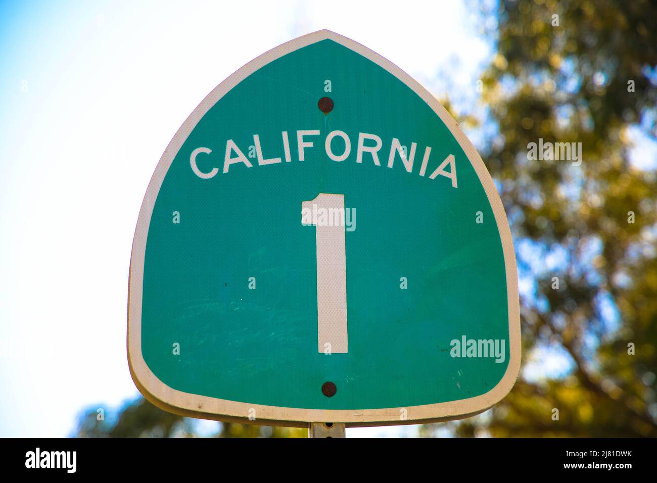 California highway 1. Green sign on the street against blue sky. California, United States Stock Photo
