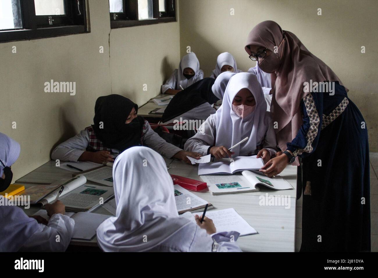 Bandung, West Java, Indonesia. 12th May, 2022. Teachers are seen ...