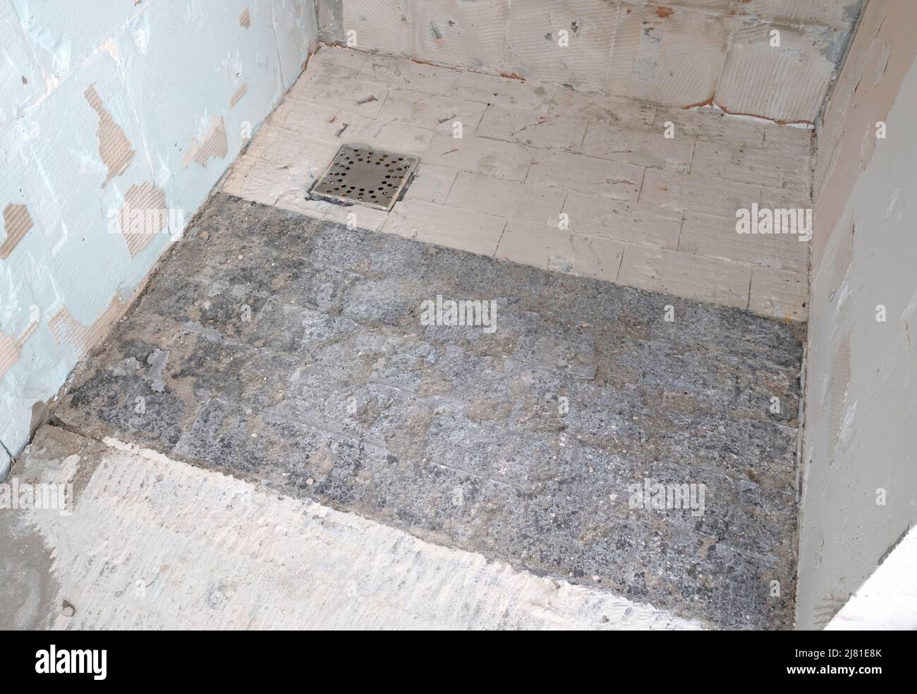 Preparation or repair of the bathroom, removing old tiles Stock Photo