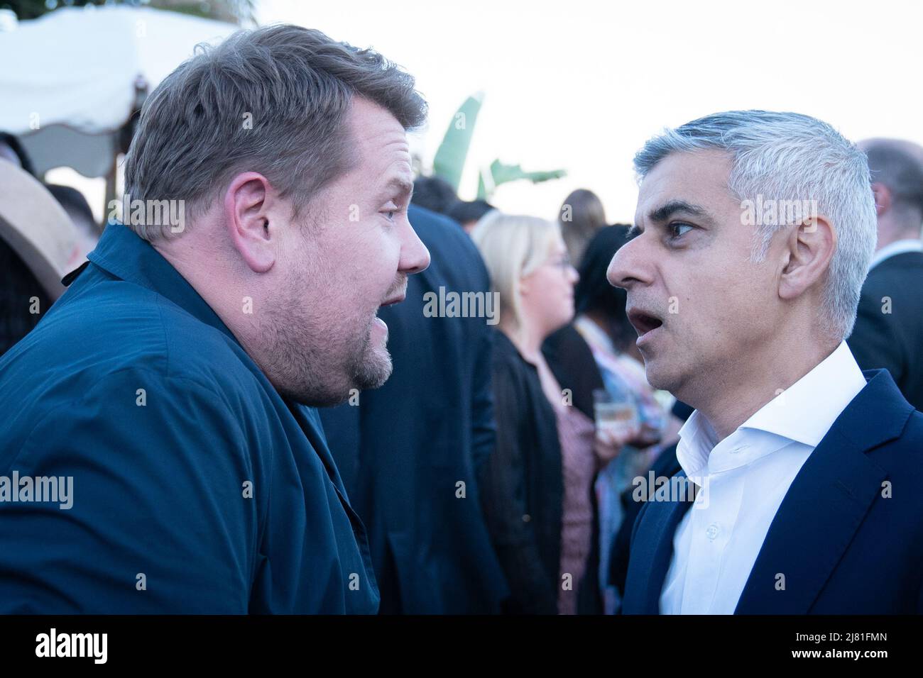 Mayor of London Sadiq Khan talking to late-night TV host James Corden at a reception for the creative industries hosted by the mayor in Hollywood, California during his 5 day visit to the US in a bid to boost London's tourism industry. Picture date: Tuesday May 10, 2022. Stock Photo