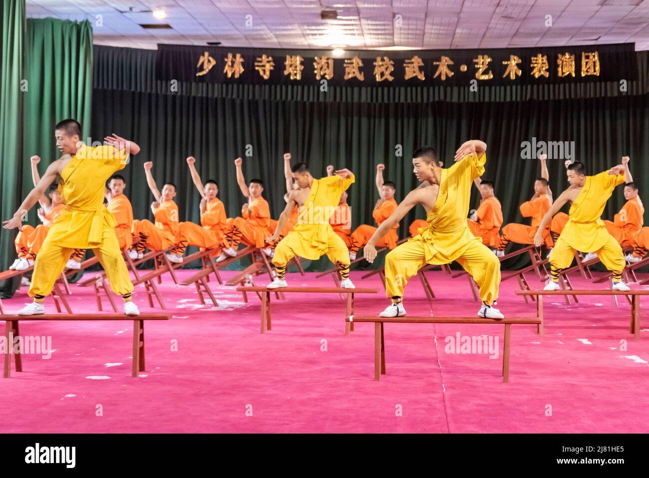 Apprentices at the famous Shaolin Temple at Dengfeng, Henan, China perform their martial arts and acrobatic skills. Stock Photo