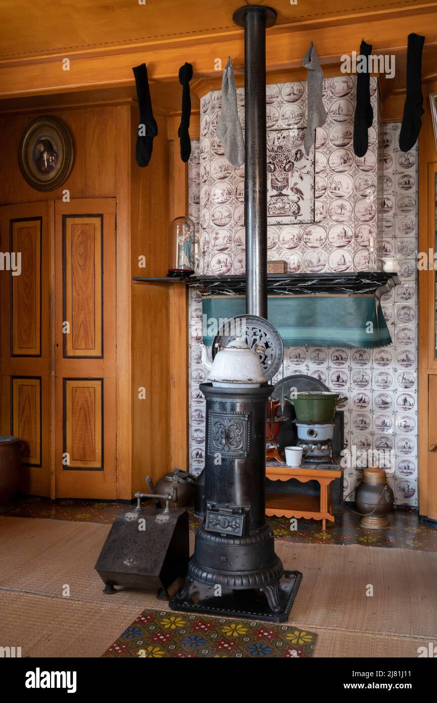 Old fashioned Dutch interior, wooden stove and room decoration in ...