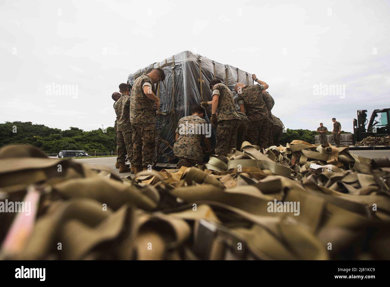 Kadena Air Base, Okinawa, Japan. 6th May, 2022. U.S. Marines with III Marine Expeditionary Force prepare pallets of body armor, individual first aid kits, and other non-lethal equipment essential to Ukraine's front-line defenders for transport at Kadena Air Base, Okinawa, Japan, May 6, 2022. The United States is working to expedite deliveries of security assistance to meet urgent needs and will continue to utilize all available tools to support Ukraine's Armed Forces in their ongoing fight to maintain sovereignty and territorial integrity. (Credit Image: © U.S. Marine/ZUMA Press Wire Servic Stock Photo