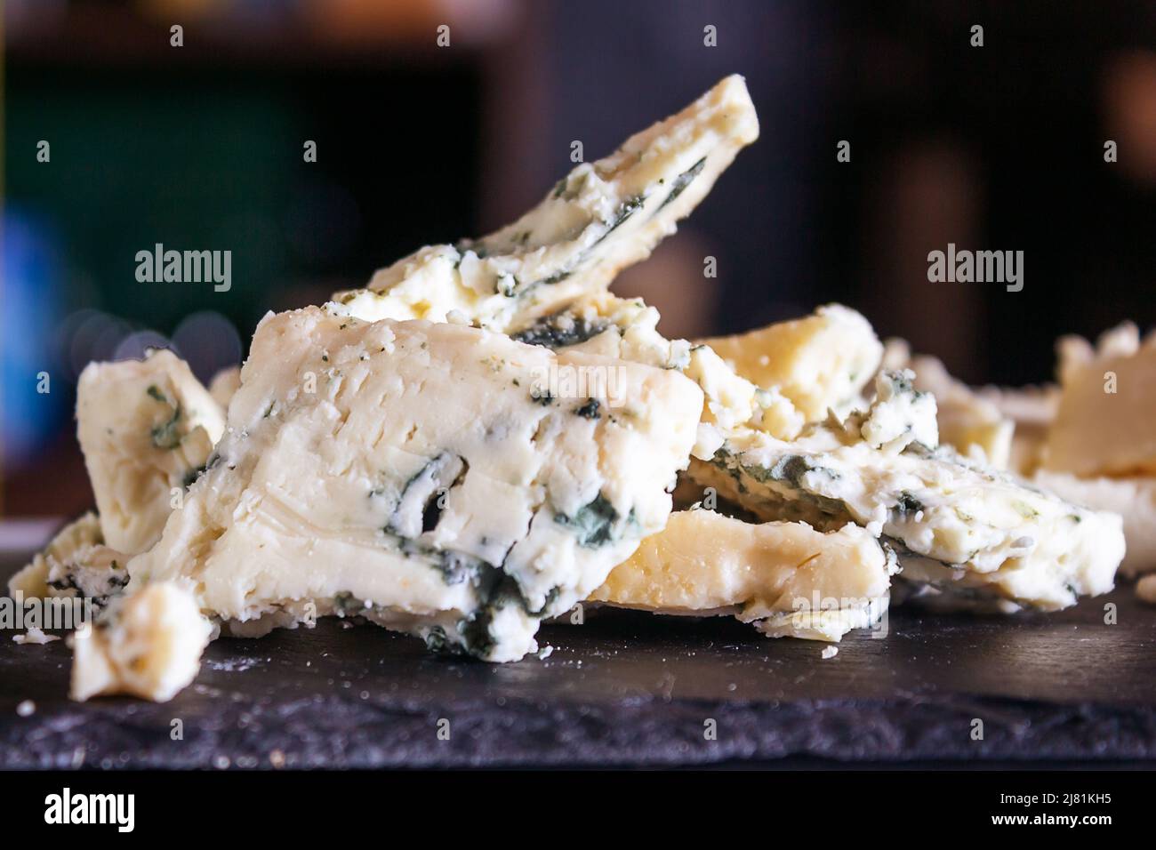 Cheese shop. Roquefort. Selective focus. Close up. Stock Photo