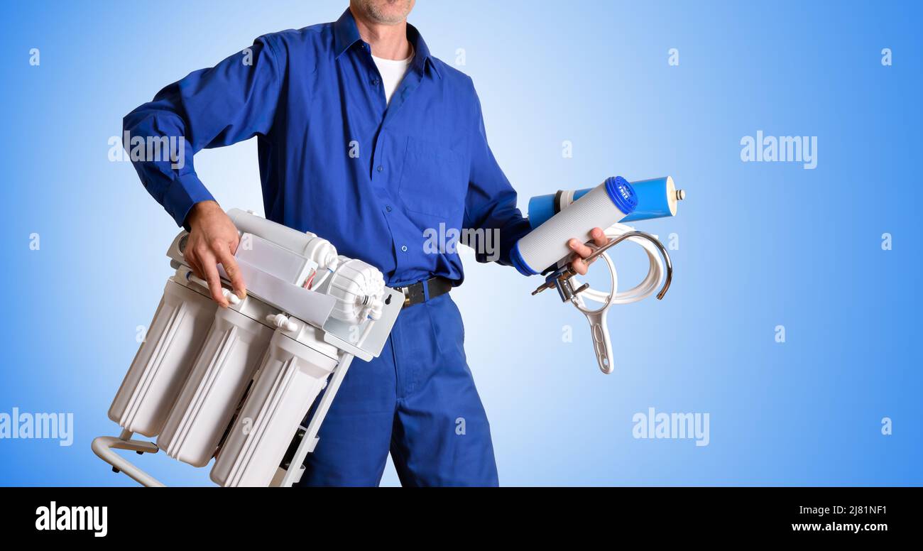 Water treatment technician with tools and spare parts for the