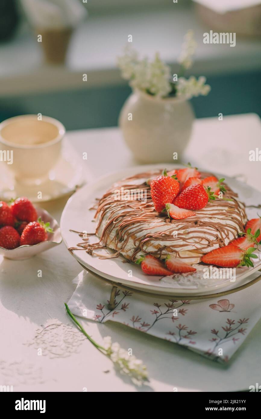 birthday cake with cream, strawberries and chocolate Stock Photo - Alamy