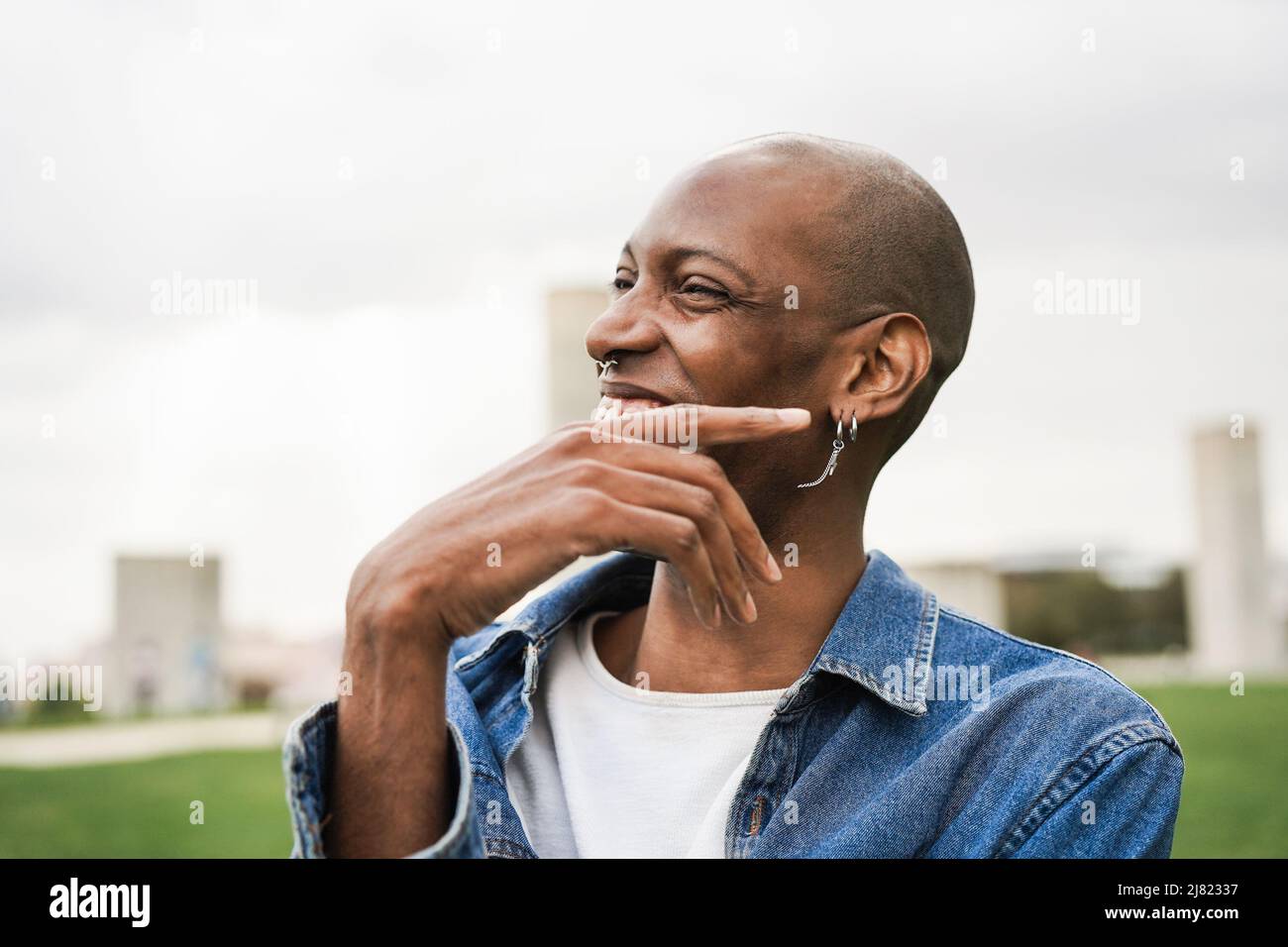 Bohemian african man having fun outdoor - Focus on eye Stock Photo