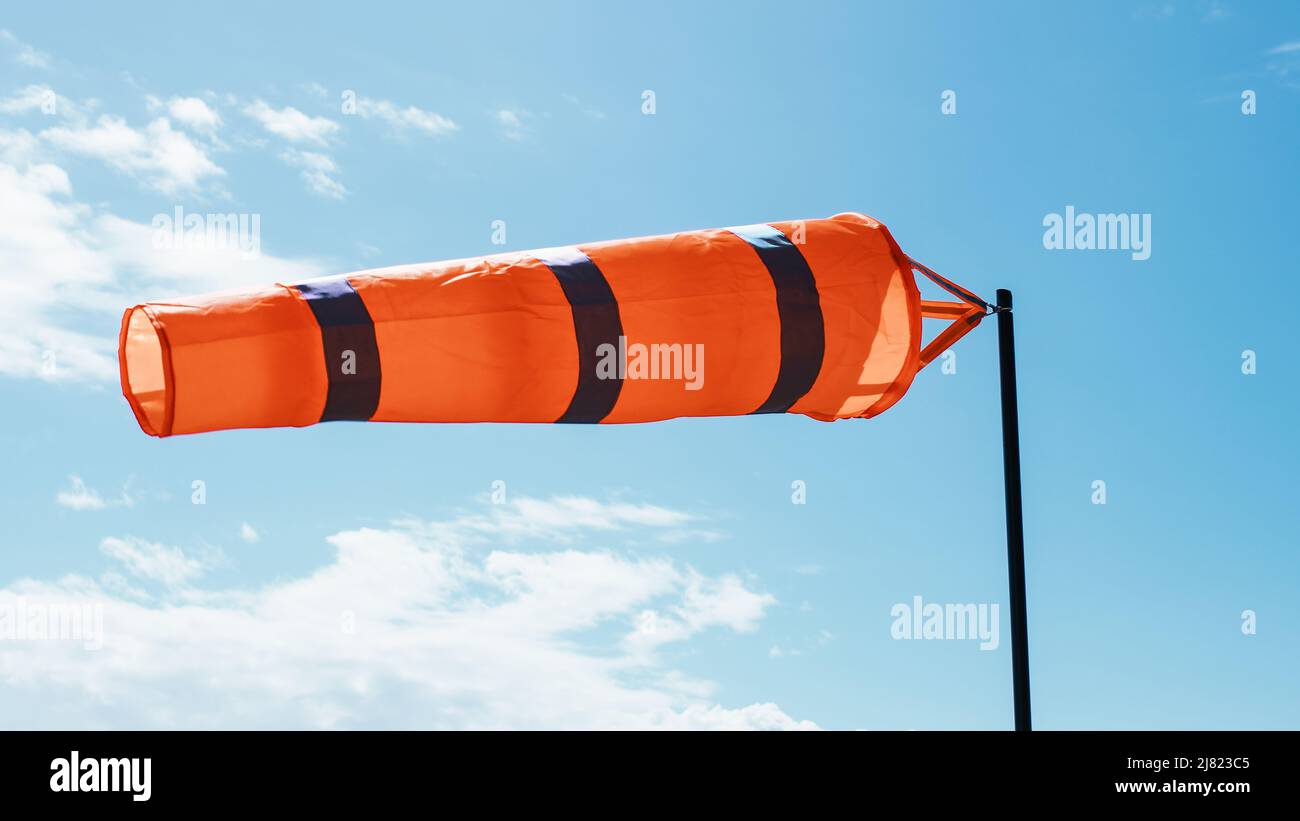 windsock with blue sky on background Stock Photo