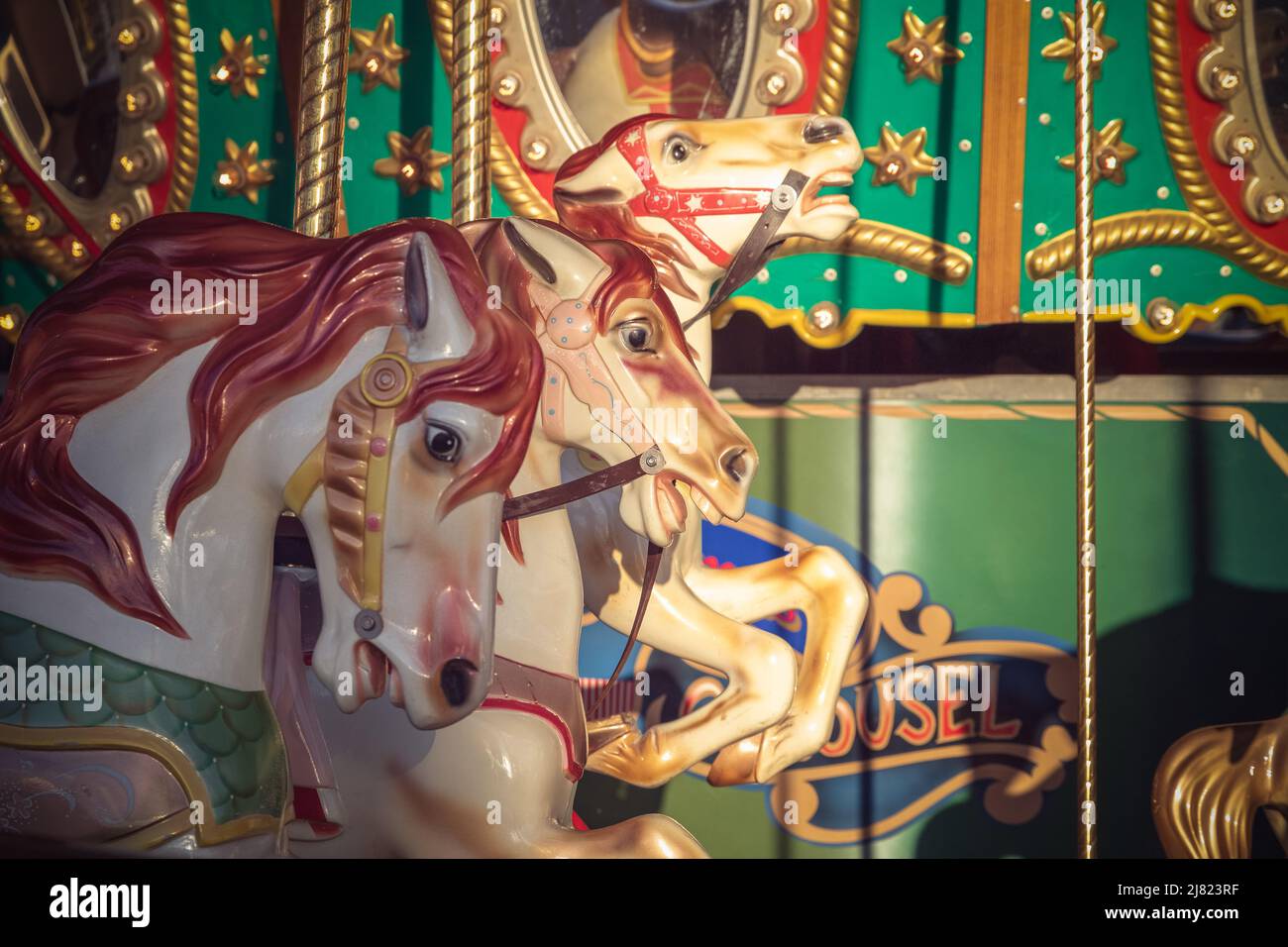 Roundabout or merry-go-round at Christmas funfair Hyde Park Winter Wonderland in London Stock Photo