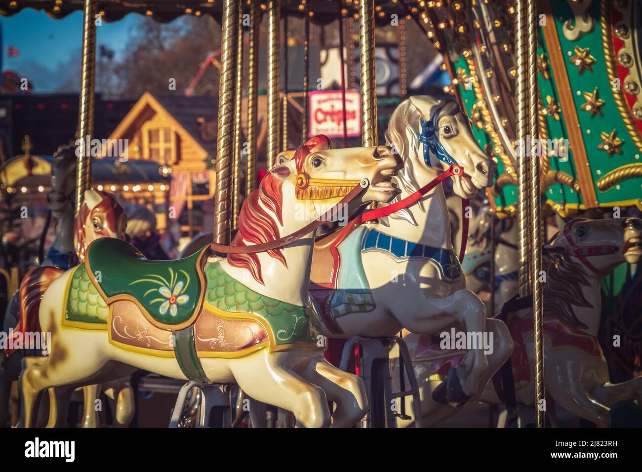 Roundabout or merry-go-round at Christmas funfair Hyde Park Winter Wonderland in London Stock Photo