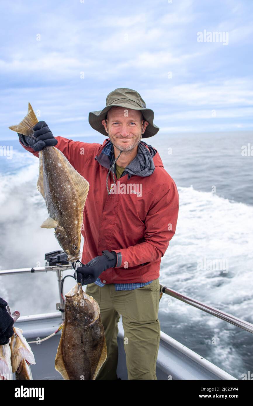 Deep sea hallibut fishing, the Sizzler, Rainbow Tours, Homer, Alaska, USA Stock Photo