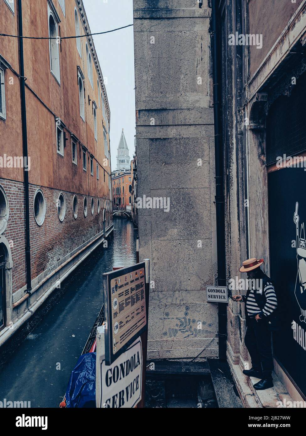 Gondola service leading down towards St Mark's Campanile, Venice Stock Photo