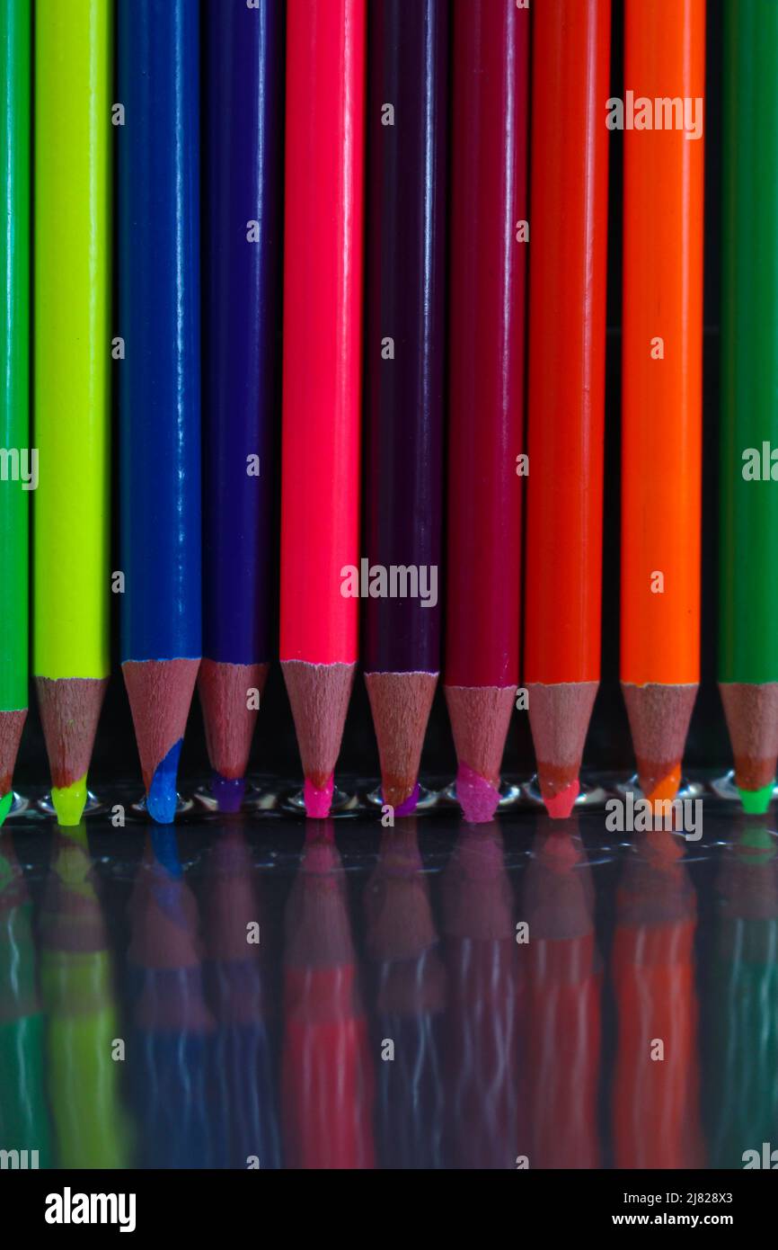 An overview shot of brightly colored pencil crayons Stock Photo by