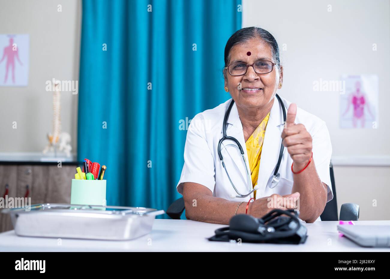 Indian woman showing thumbs up hi-res stock photography and images - Alamy