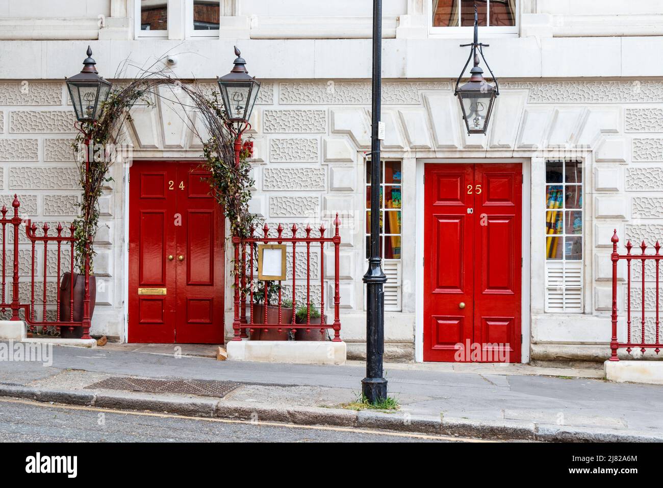 Two red front doors in Clerkenwell Green,  London, UK Stock Photo