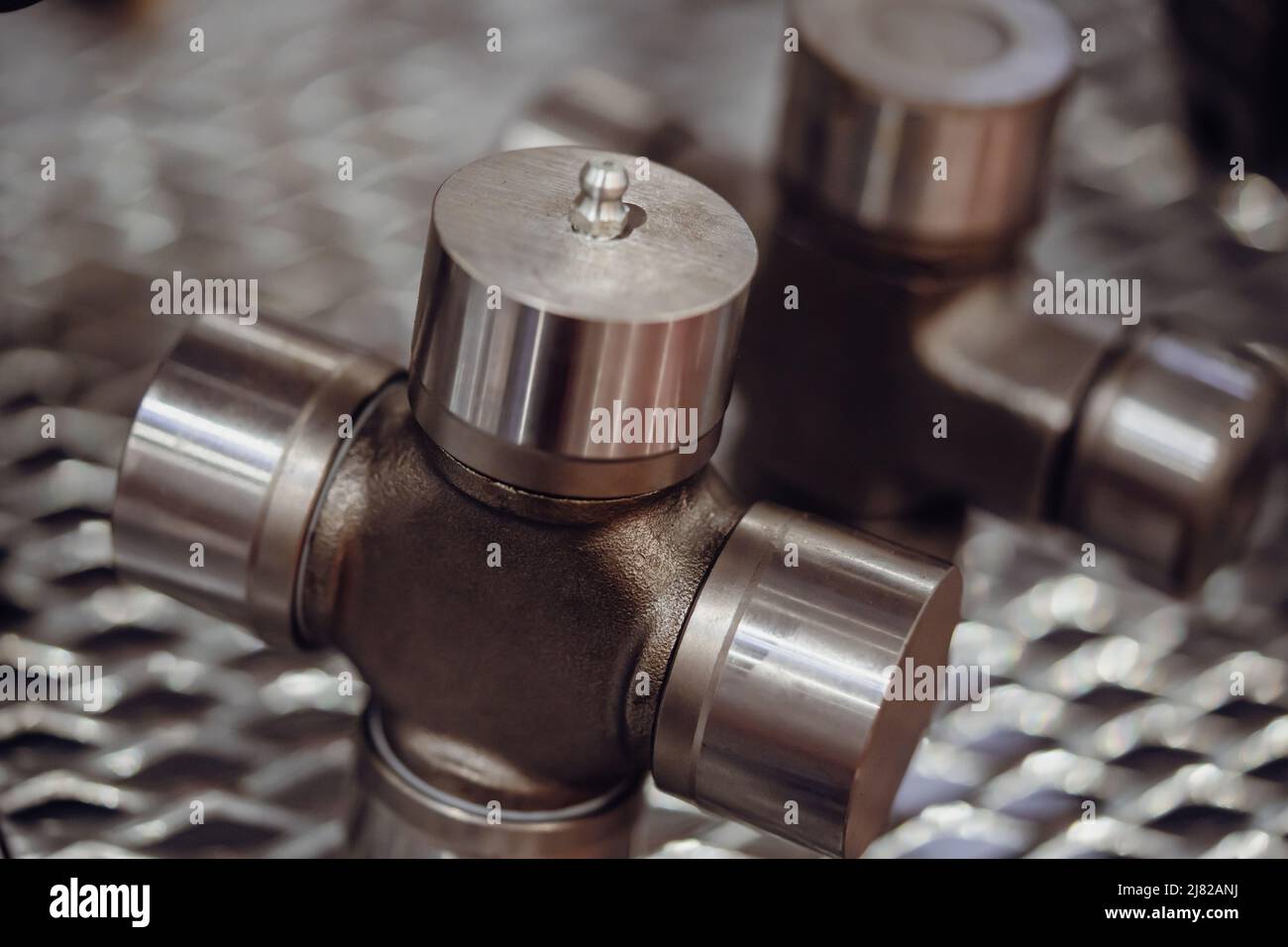 Cross of the cardan drive shaft, part of the car's transmission Stock