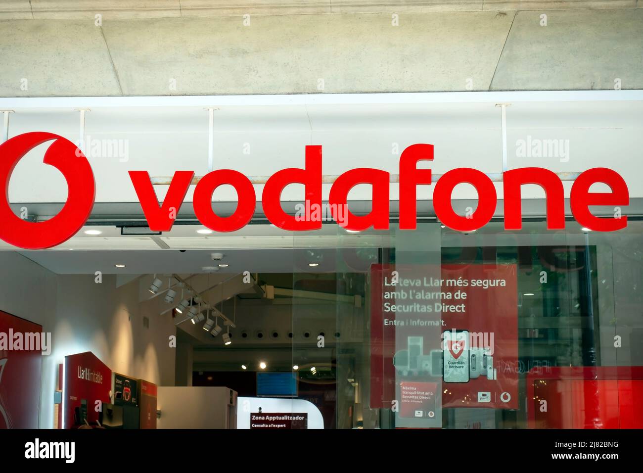 Barcelona, Spain - May 9, 2022, Vodafone shop sign. Vodafone is a British multinational telecommunications company. Stock Photo