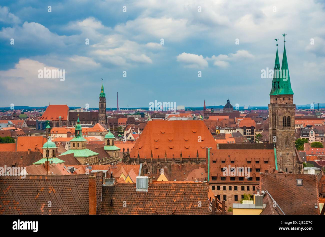 Gorgeous rooftop view over the historic city centre of Nürnberg, Germany. On the left stands the medieval church St. Lawrence (Lorenzkirche) and on... Stock Photo