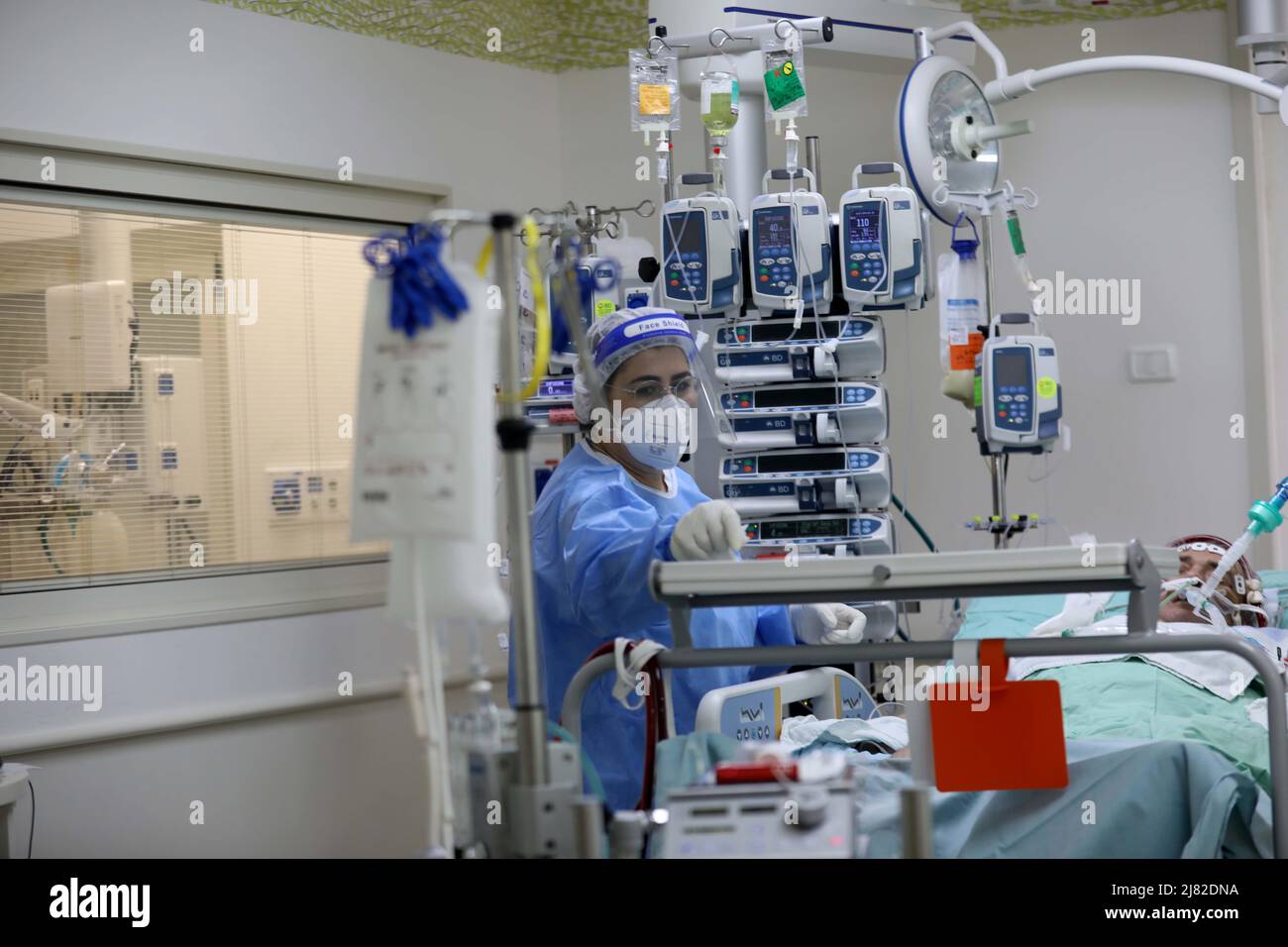 Rehovot, Israel. 11th May, 2022. A nurse looks after a patient at Kaplan Hospital in Rehovot, Israel, May 11, 2022. The International Nurses Day falls on May 12. Credit: Gil Cohen Magen/Xinhua/Alamy Live News Stock Photo