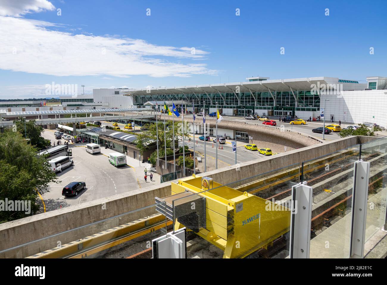 Vancouver International Airport Building Exterior Seen From The Light Rail Station Stock Photo