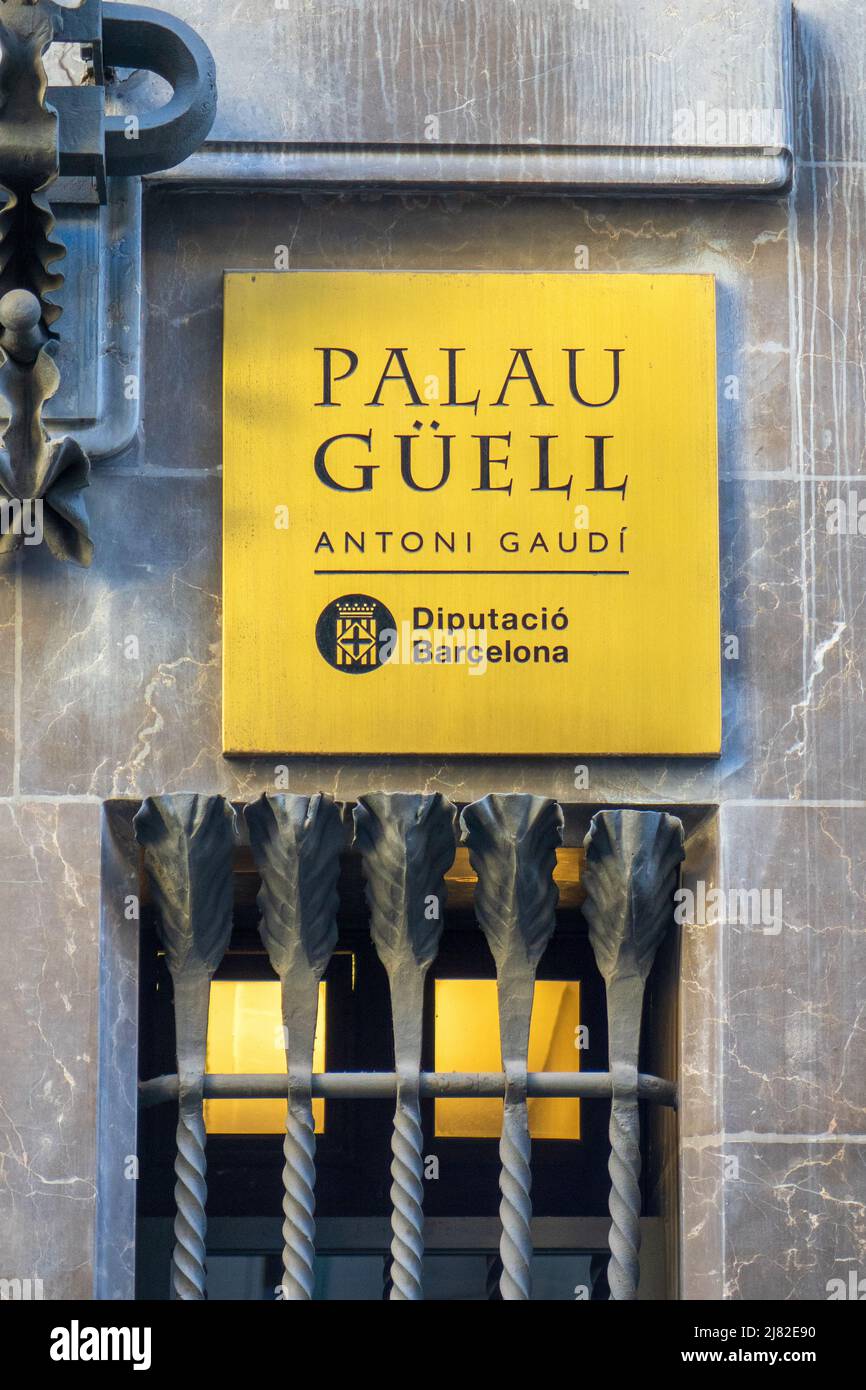 The Sign Outside The Palau Güell Mansion Designed By The Architect Antoni Gaudi In Barcelona Spain The Mansion Is Now A Tourist Attraction Stock Photo
