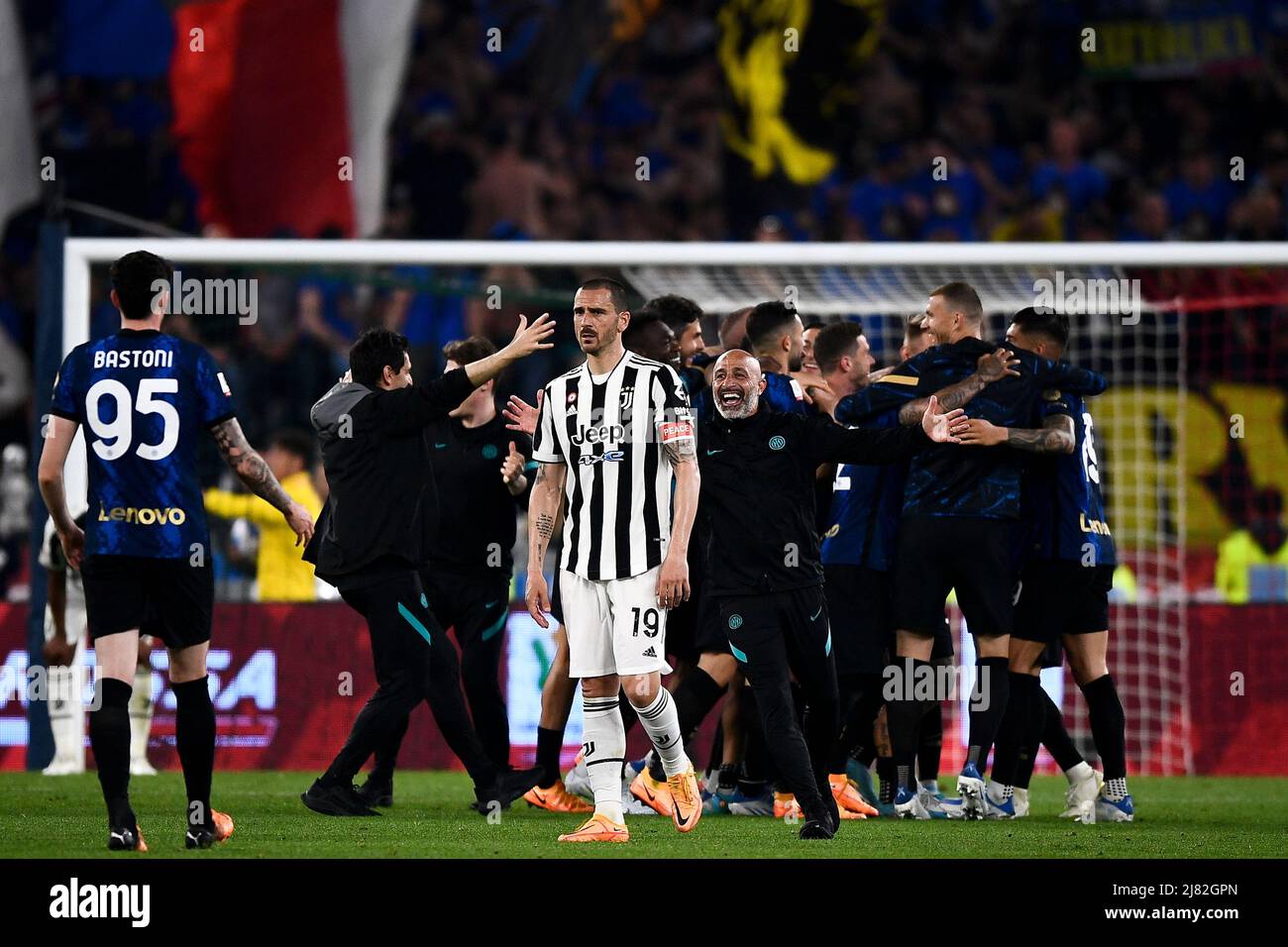 Rome, Italy. 11 May 2022. Leonardo Bonucci of Juventus FC looks dejected as players of FC Internazionale cleebrate the victory at the end of the Coppa Italia final football match between Juventus FC and FC Internazionale. Credit: Nicolò Campo/Alamy Live News Stock Photo