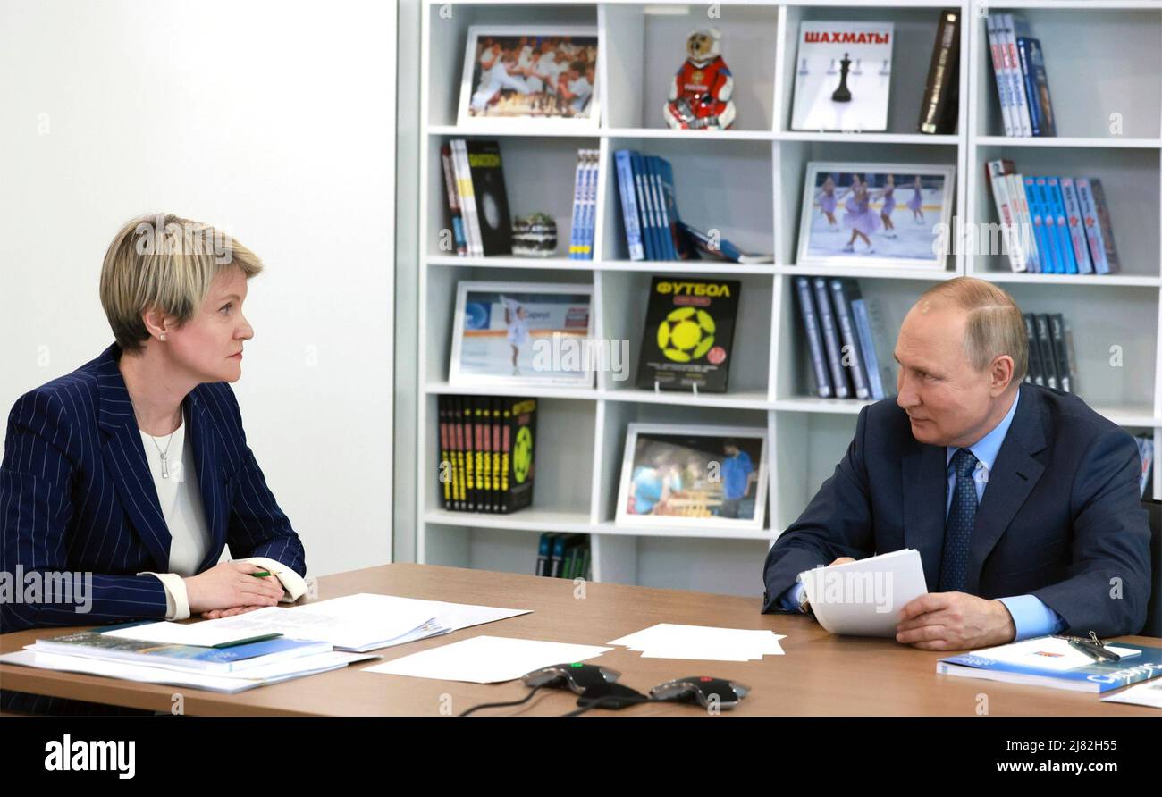 Sochi, Russia. 11th May, 2022. Russian President Vladimir Putin and Talent and Success Foundation head Yelena Shmeleva, attend a teleconference meeting of the Talent and Success Foundation Board of Trustees at the Sirius Educational Centre, May 11, 2022 in Sochi, Russia. Credit: Mikhail Metzel/Kremlin Pool/Alamy Live News Stock Photo