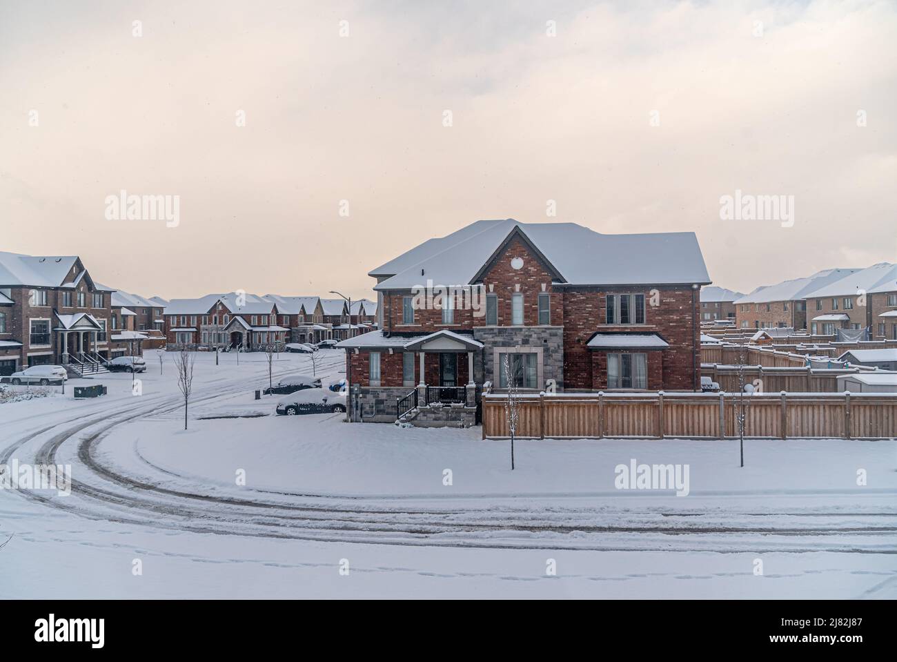House covered by snow in residential area, Canada Stock Photo - Alamy