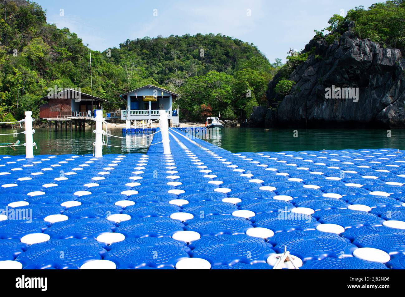 Security extraction point Ko Khao Yai and plastic pontoons pier in sea ocean of Mu Ko Petra National Park for check and service thai travelers people Stock Photo