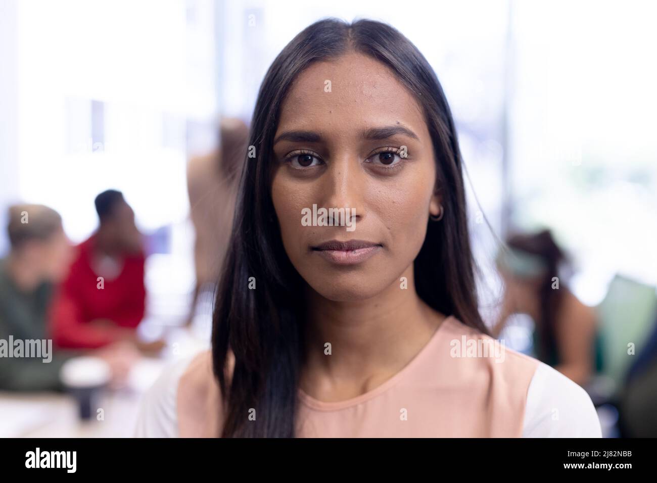 Portrait of confident african american female advisor at office Stock Photo