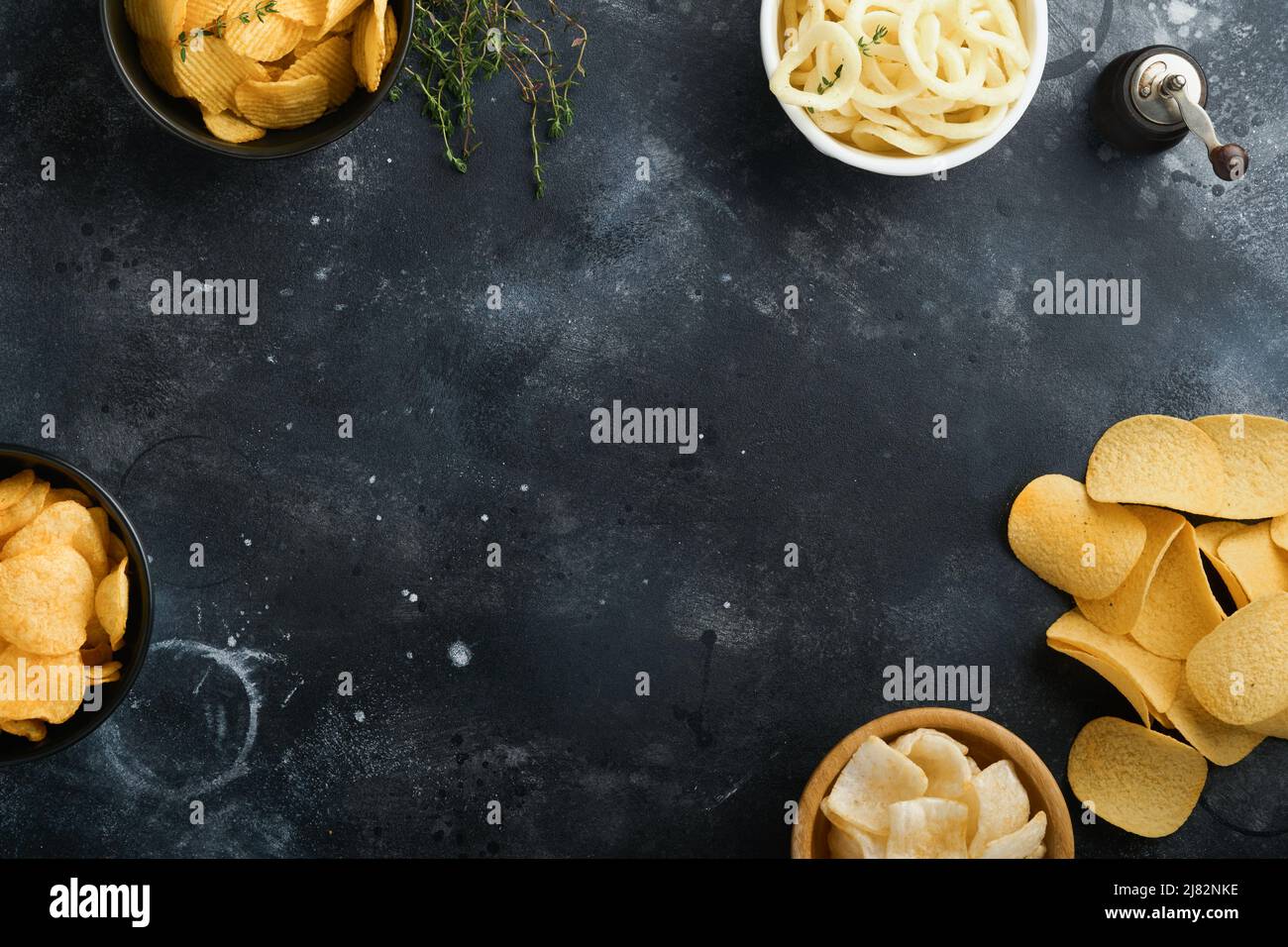 Unhealthy food. Snacks. All classic potato snacks with peanuts, popcorn