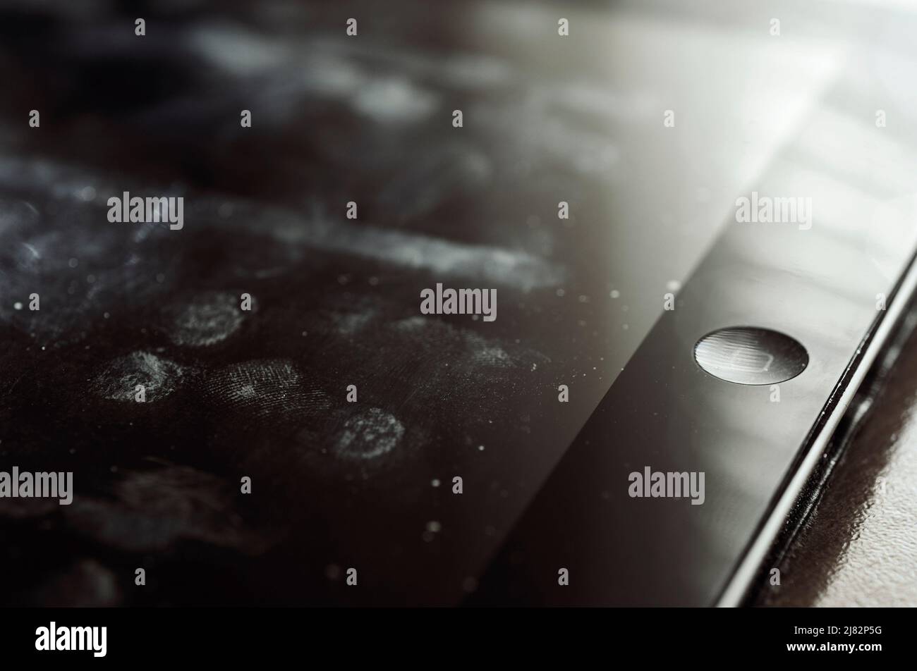 dirty marks and fingerprints on ipad screen Stock Photo