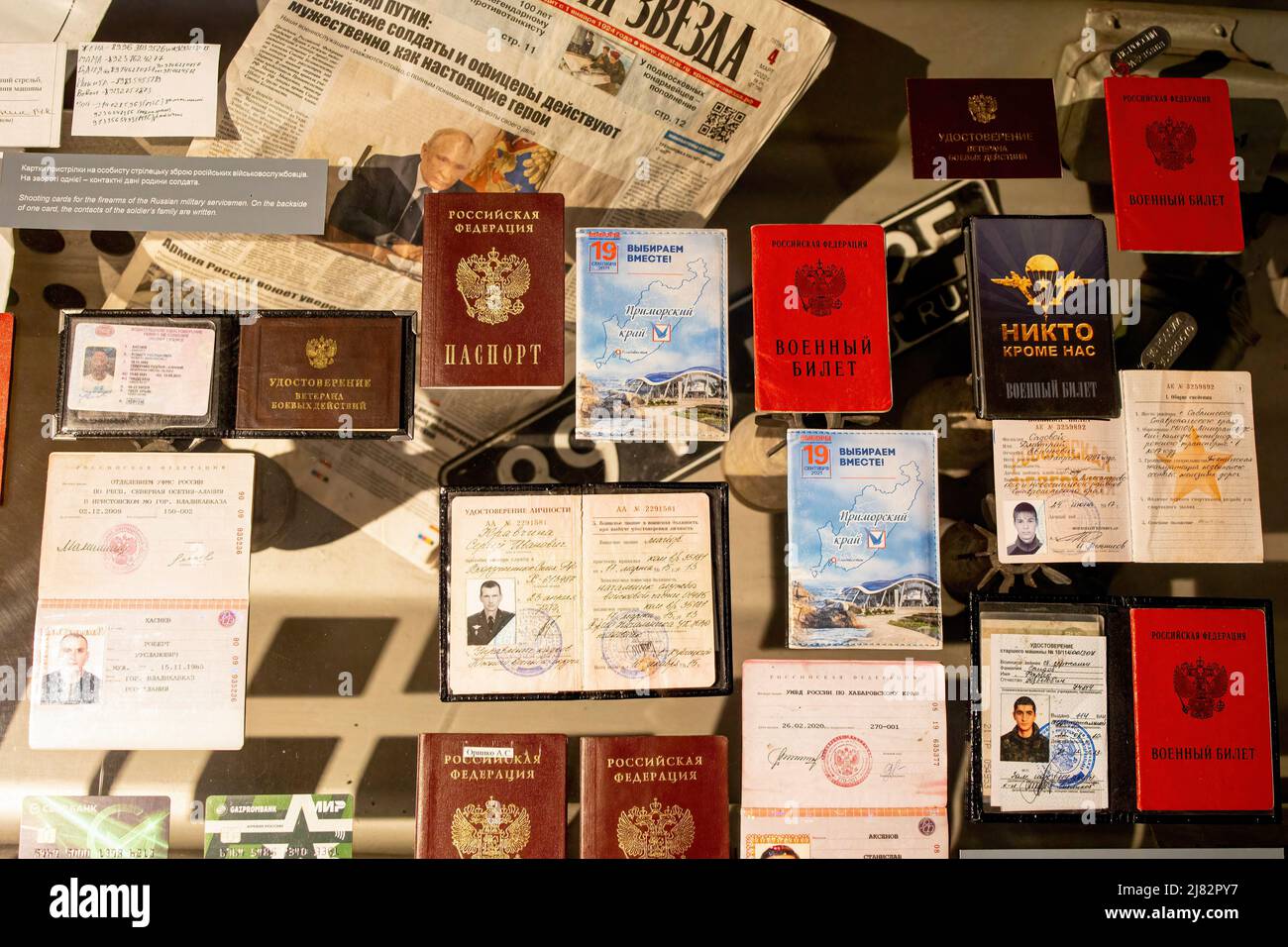 A display of a collection of personal identification documents from the fallen Russian soldiers found at the de-occupied villages around Kyiv shows at the exhibition at the National Museum of the History of Ukraine. 'Ukraine: Crucifixion' exhibition opens in the National Museum of the History of Ukraine dedicated to the Russian invasion to Ukraine, particularly in Kyiv. The exhibition displayed a collection of evidences of war from the de-occupied villages around Kyiv. Russia invaded Ukrainian territory on February 24, 2022, triggering the largest military attack in Europe since World War II. Stock Photo