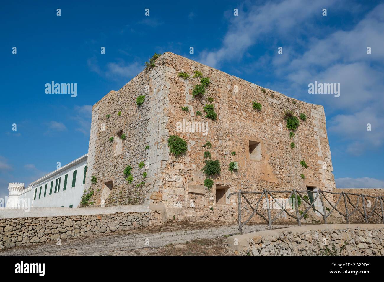 Defensive tower next to the Virgen del Toro sanctuary. It is in the Mount of El Toro, municipality of Es Mercadal, Menorca, Spain, and was built in 15 Stock Photo