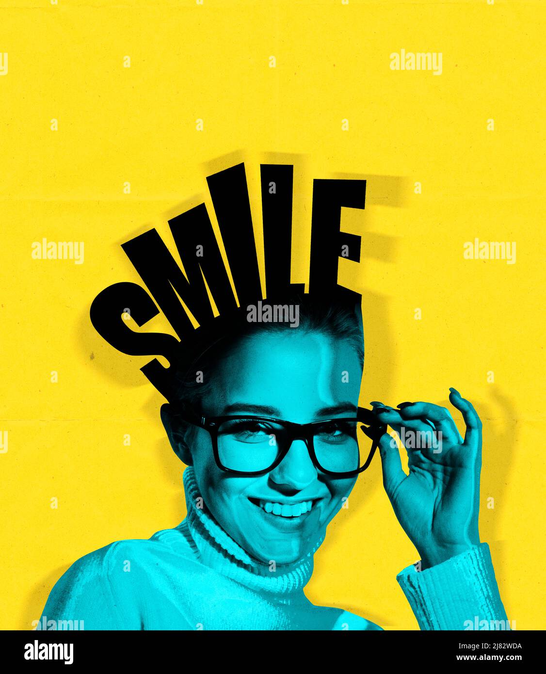 Creative portrait young beautiful girl with lettering smile on her head ...