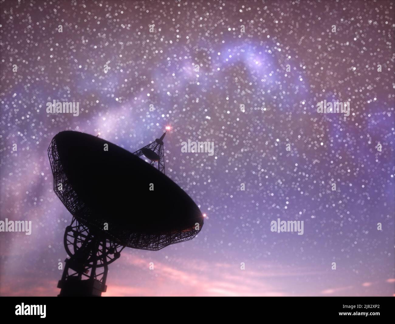 Giant satellite dish signal at dusk with the starry sky out of focus with shallow depth of field. Stock Photo