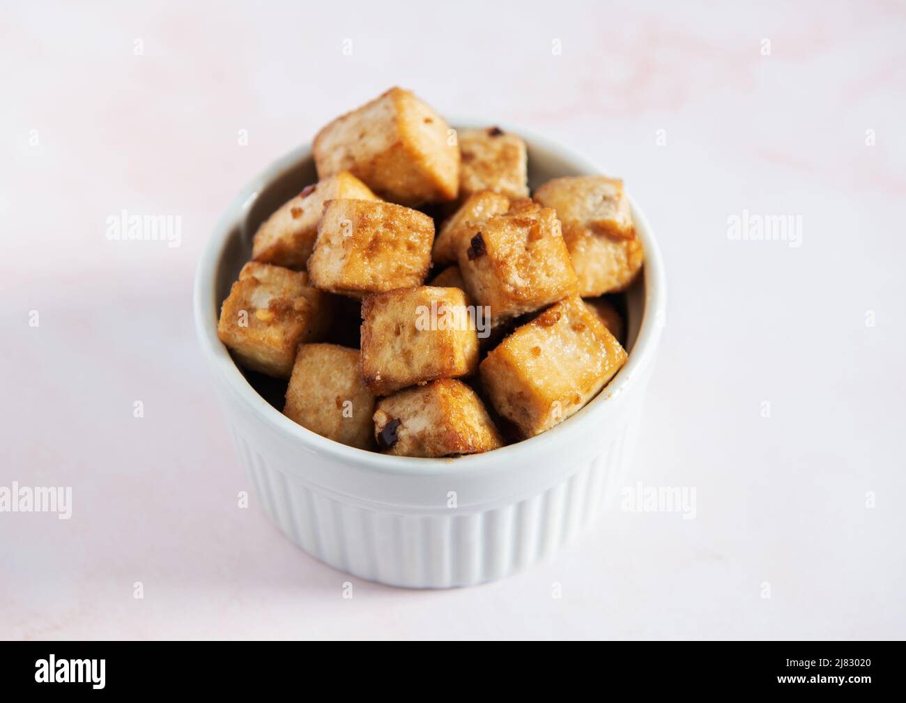 Baked Tofu with spices in a ramekin Stock Photo Alamy