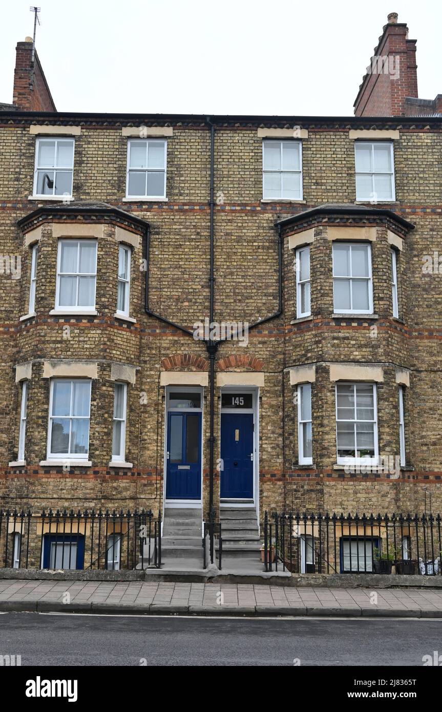 Terraced brick fronted properties on Walton Street in the Oxford suburb