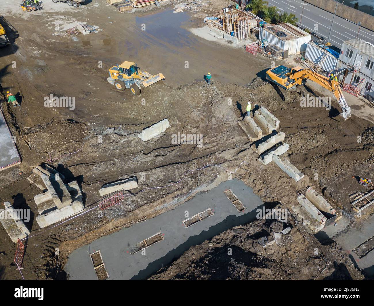 Drone view of a construction site, excavator, tractor. Aerial ...