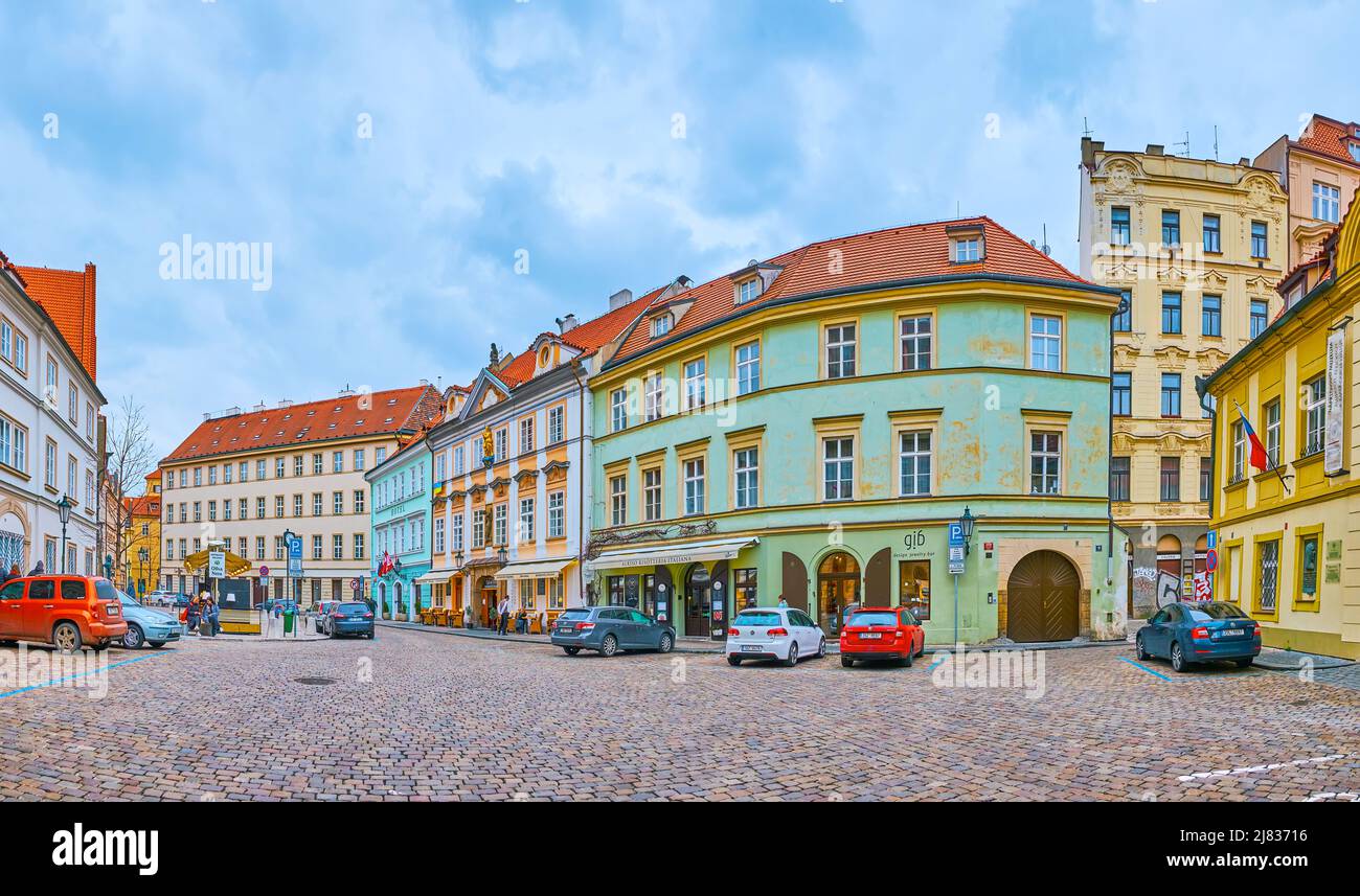 PRAGUE, CZECH REPUBLIC - MARCH 5, 2022: Panorama of historic Bethlehem Square with colorful mansions and small restaurants, on March 5 in Prague Stock Photo