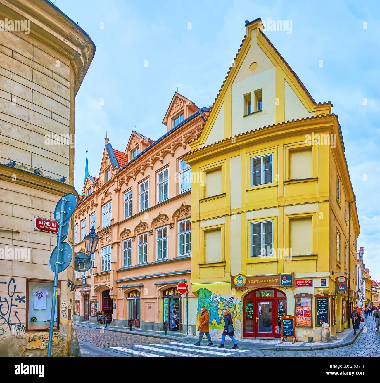 PRAGUE, CZECH REPUBLIC - MARCH 5, 2022: Panorama of Bethlehem Square with historic housing and Svejk Restaurant with colorful mural, on March 5 in Pra Stock Photo
