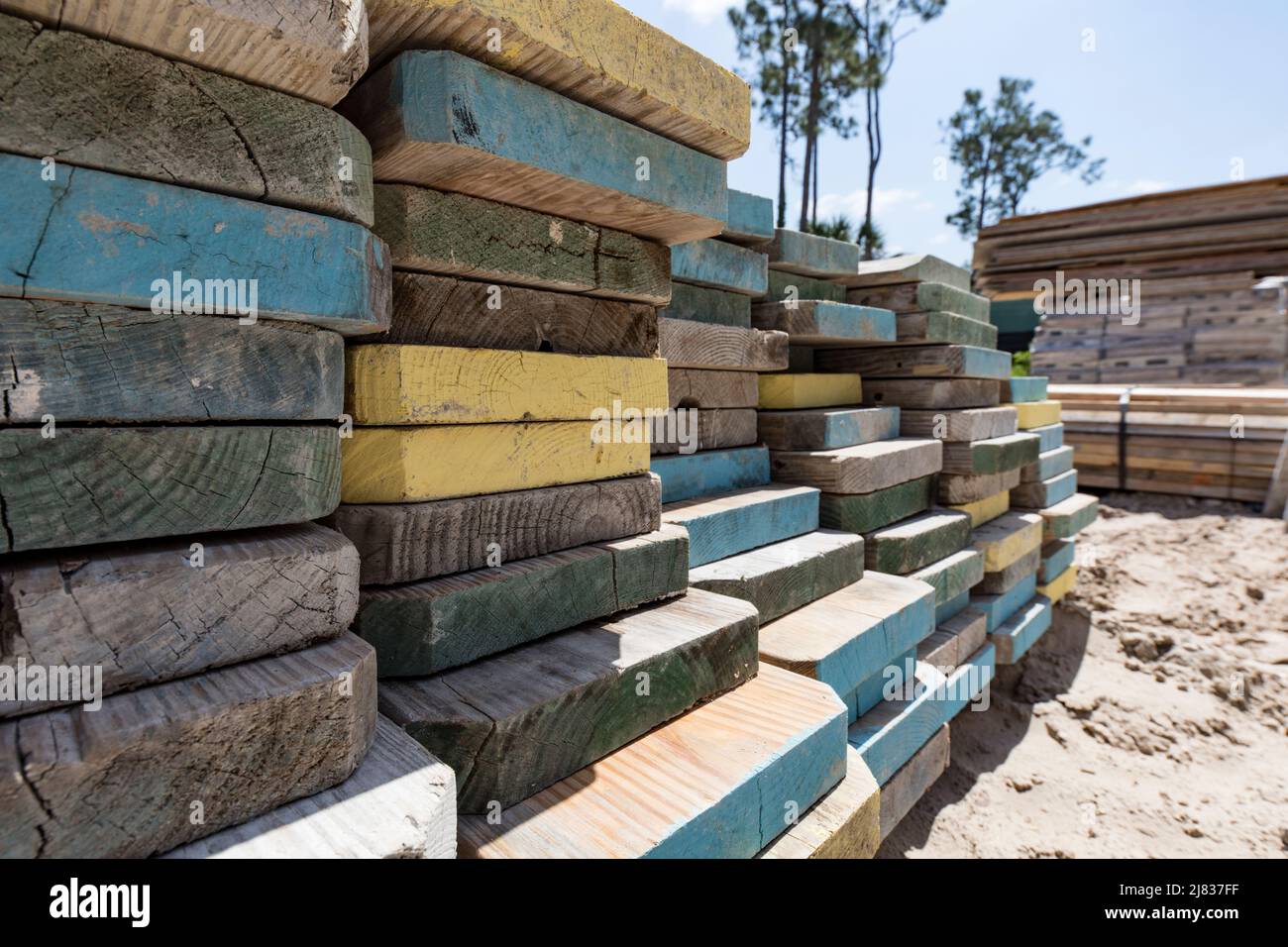 large stacks of scaffolding wooden planks Stock Photo - Alamy